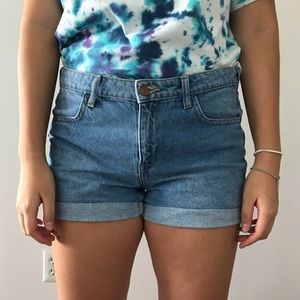 Medium wash mid rise denim shorts
